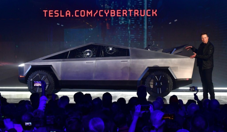 Tesla co-founder and CEO Elon Musk presentING the all-electric battery-powered Tesla