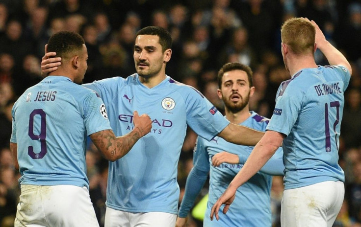 Ilkay Gundogan celebrates after scoring in the 1-1 draw with Shakhtar Donetsk that took them through to the last 16