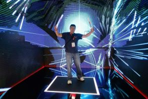A man plays "Beat Saber" during the E3 Video Game Convention in Los Angeles in June 2019