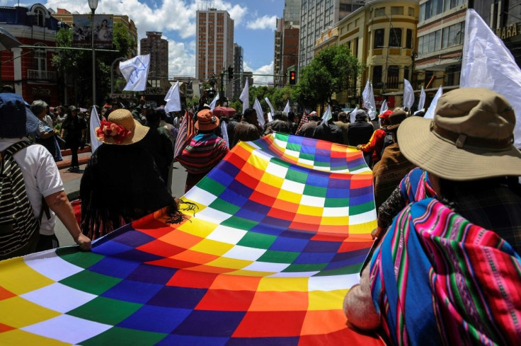 Demonstrators march to demand peace in La Paz, on November 19