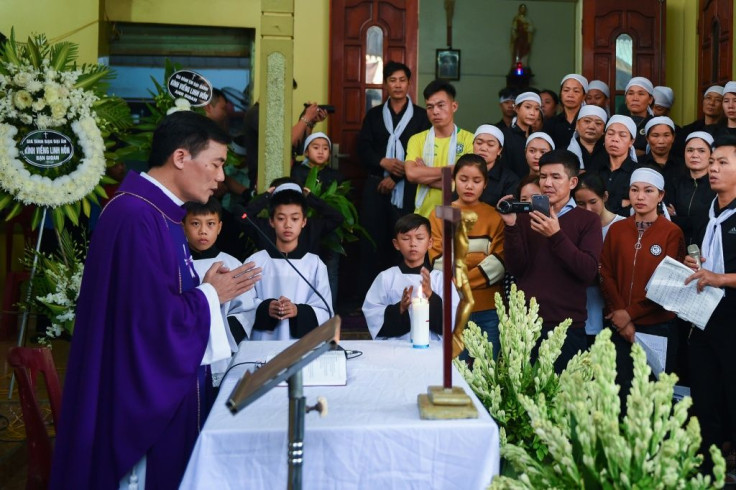 Villagers gathered to pray and sing hymns at the homecoming - grief-stricken but also relieved to finally have the bodies back on home soil