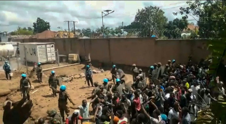 An angry crowd confronted peacekeepers at a UN compound on the outskirts of Beni on Monday. Local people accuse the UN mission in DR Congo of failing to protect them against the notorious ADF militia