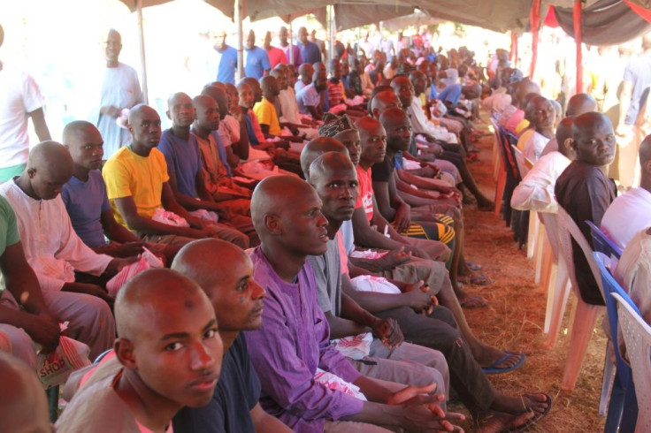 Freed: Former inmates at the ceremony in Maiduguri, where they were declared to have been cleared of being Boko Haram suspects