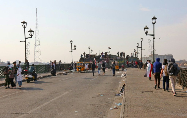 Police have sought to keep protesters from reaching the Al-Ahrar bridge in Baghdad that crosses the river Tigris leading to key government buildings