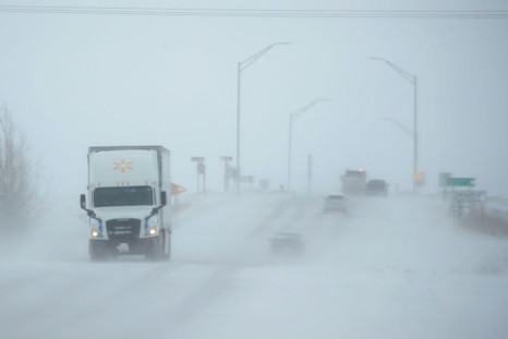 Snow blows across a road on November 27, 2019 near Rudd, Iowa
