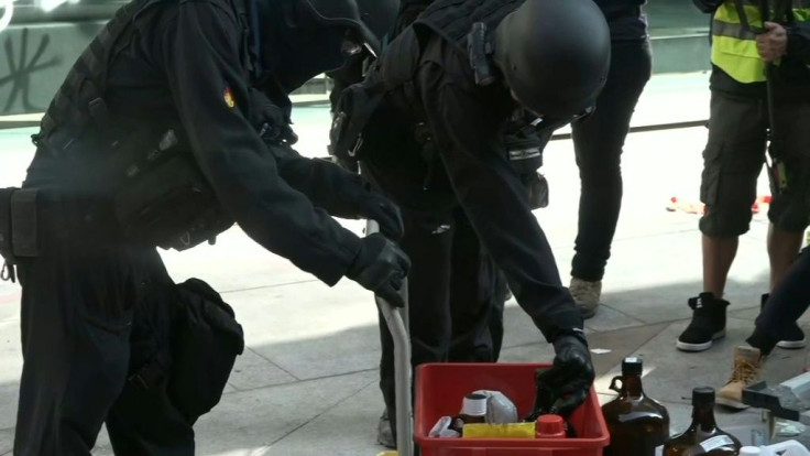 IMAGESHong Kong police look for petrol bombs and other dangerous materials after entering a ransacked university campus where authorities faced off for days with barricaded pro-democracy protesters.