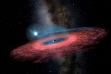 Too big: Astronomers say the black hole they have found is twice as massive it should be, according to existing models
