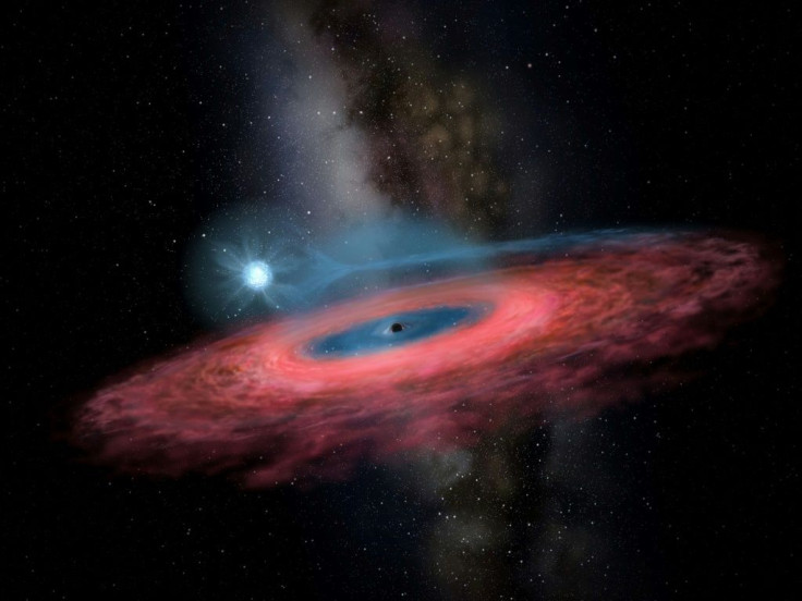 Too big: Astronomers say the black hole they have found is twice as massive it should be, according to existing models