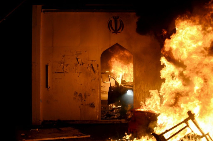 Iraqi forces are cracking down on anti-government protesters after demonstrators torched the Iranian consulate in the holy city of Najaf