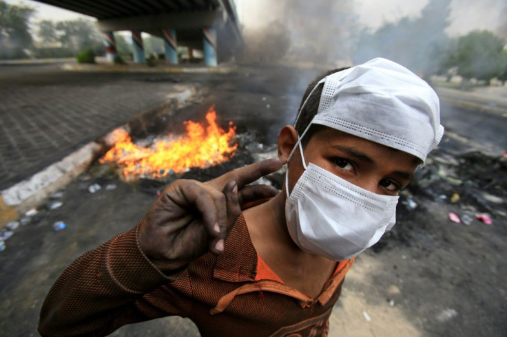 A young Iraqi demonstrator in the central city of Karbala amid ongoing anti-government protests that have claimed over 360 lives