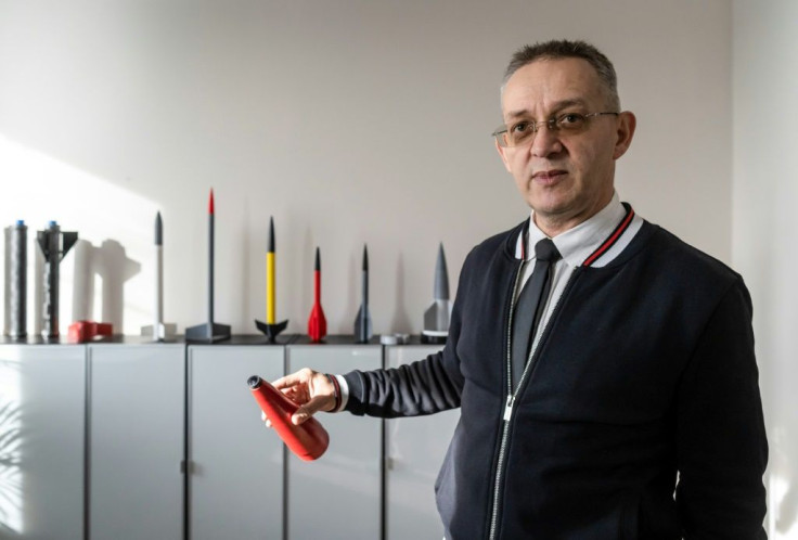 Founder and chief inventor of Polish firm Spartaqs Slawomir Huczala poses with parts of an Aerostatic Rocket Launcher (ARL) drone at his company's headquarters of the firm in Mikolow, southern Poland, on November 20, 2019. The Aerostatic Rocket Launcher (