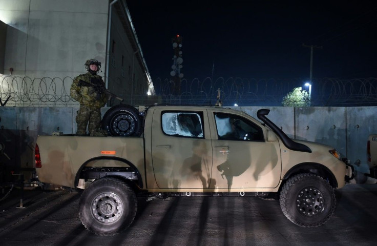 A US soldier stands guard during a surprise visit of US President Donald Trump at Bagram Air Field on November 28, 2019 in Afghanistan