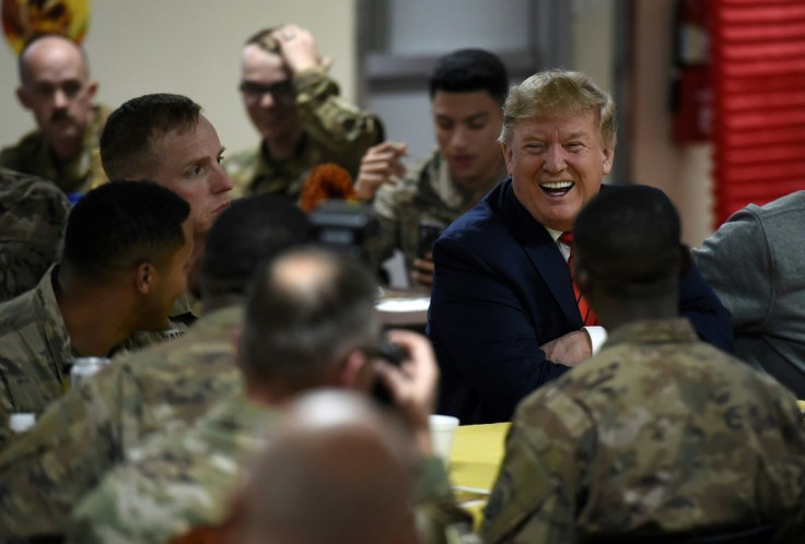 US President Donald Trump eats Thanksgiving dinner with US troops in Afghanistan