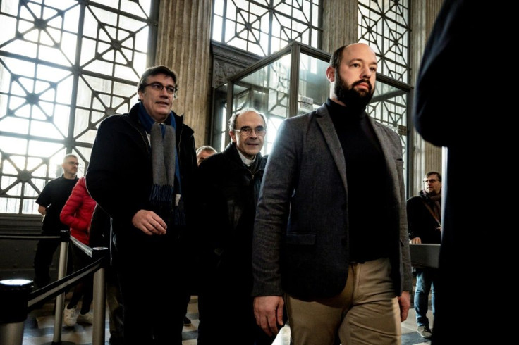 French cardinal Philippe Barbarin, centre, arrived at an appeal hearing in Lyon, France, on Friday to contest his six-month suspended sentence for failing to report sex abuse by a priest.