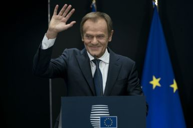 Donald Tusk was brought to the brink of tears in the brief handover ceremony
