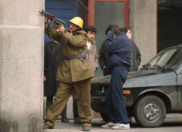 Romanian soldiers battled suspected pro-Ceaucescu gunmen during chaotic clashes that marked the Romanian uprising in December 1989