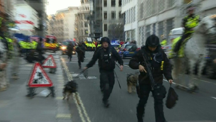 IMAGESSecurity forces arrive at the scene of a stabbing at London Bridge. Scotland Yard says they are treating the incident in which several people were injured and a man was shot "as though it is terror-related".