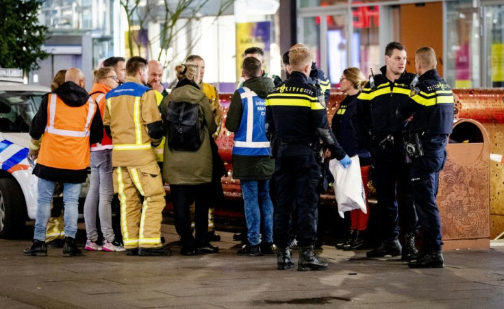 Three people were wounded in a stabbing on a shopping street in the centre of The Hague, police said