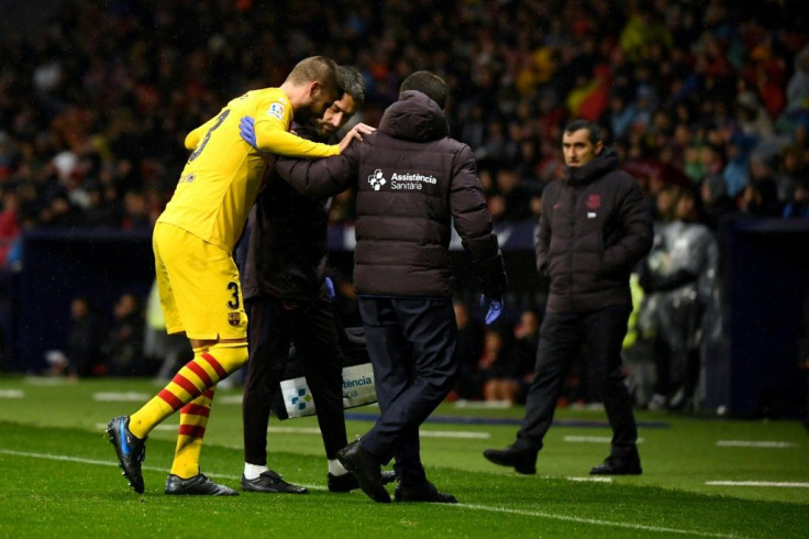 Pique was fortunate not to be sent off before hobbling from the pitch with an injury
