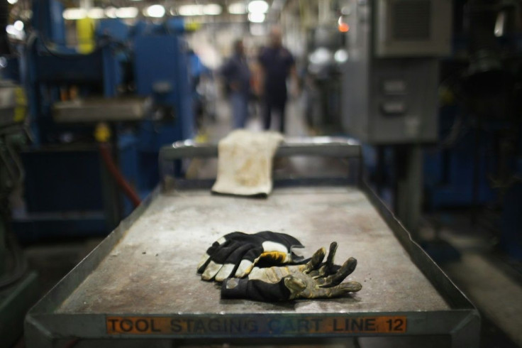 Gloves on the factory floor at Quadrant, a high-end plastic processor in Reading, Pennsylvania