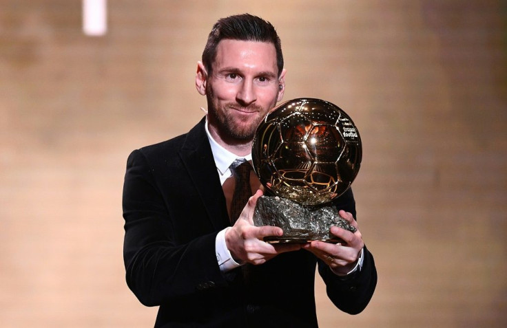 Lionel Messi happily collected his sixth  Ballon d'Or in Paris on Monday