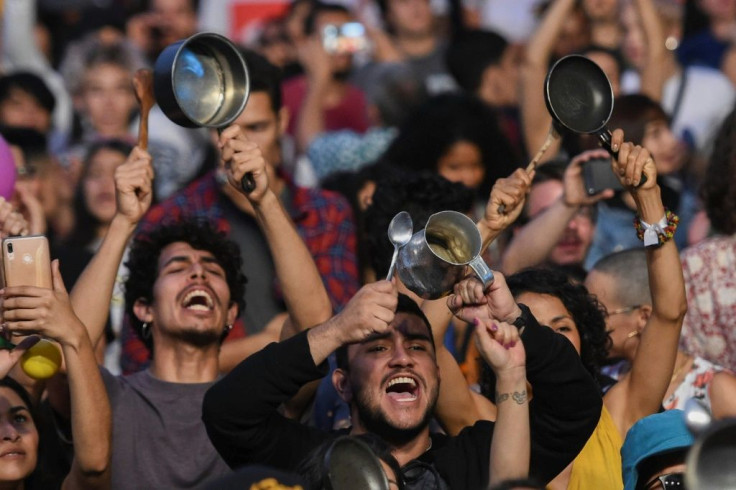 People bang pans and pots at a concert in support of the strike against President Ivan Duque's government in Medellin, Colombia on December 1, 2019