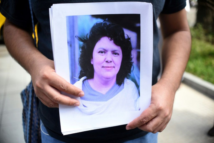 Four men have been jailed for 50 years each over the murder of Honduran environmental activist Berta Caceres, seen here