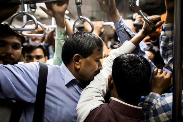 On trains in India, blind passenger Vinod Kumar Sharma is dependent on fellow commuters to navigate platforms and squeeze in and out of carriages