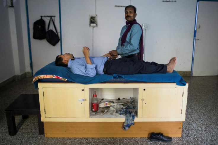 Blind Vinod Kumar Sharma has retrained as a massage therapist