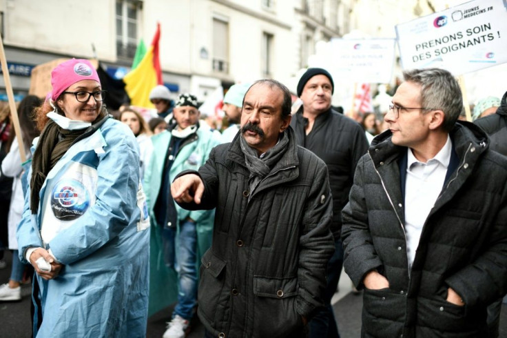 Philippe Martinez, centre, head of France's CGT labour union, at a hospital workers strike in Paris in November. He called the government's pension reform plan a "flagrant provocation."