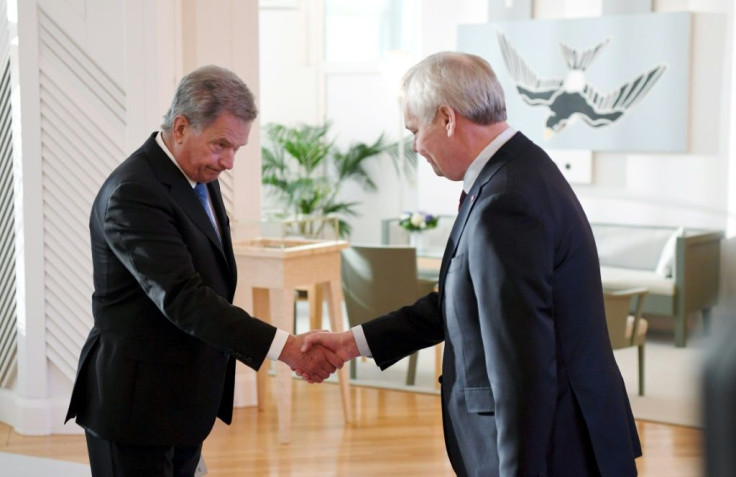 Rinne, right, resigns to the Finland's president