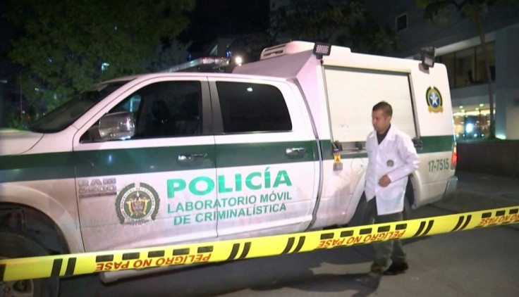A police forensics van at the scene where a French defense systems engineer was shot dead in Bogota, Colombia