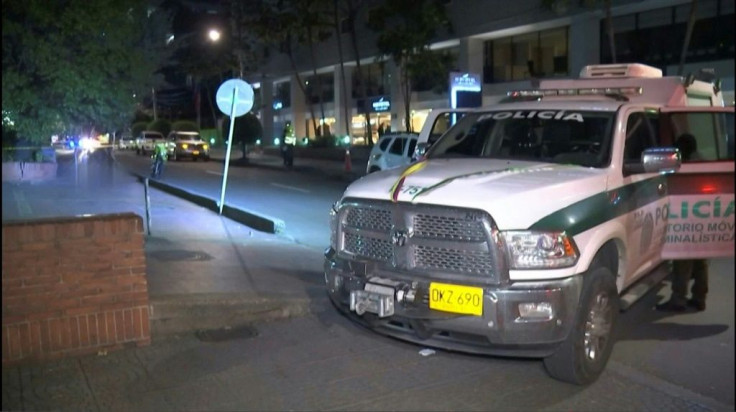 A police vehicle at the scene where a French defense systems engineer was shot dead in the Colombian capital, Bogota