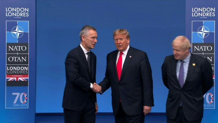 IMAGES Leaders shake hands with NATO Secretary General Jens Stoltenberg and British Prime Minister Boris Johnson on the last day of the annual NATO summit in Watford.