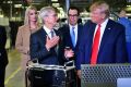US Treasury Secretary Steven Mnuchin, seen with President Donald Trump (R) and Apple CEO Tim Cook (2nd L), said countries should suspend unilateral taxes on tech giants