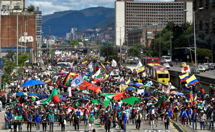 Indigenous people and students take part in a protest in Bogota against the government of Colombian President Ivan Duque
