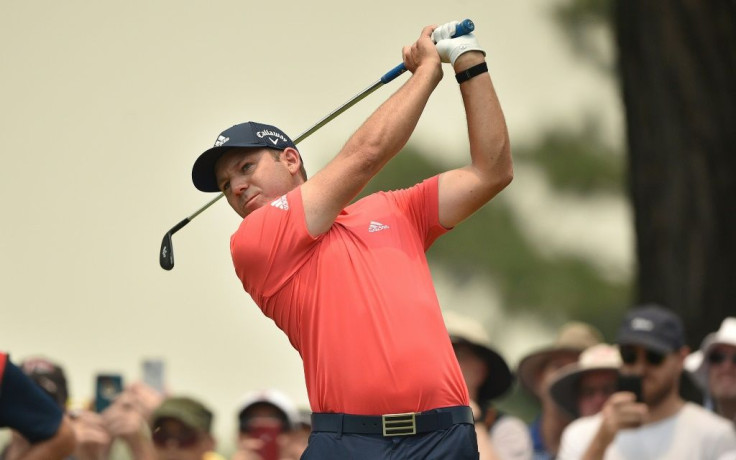 Spain's Sergio Garcia tees off at the fourth hole on day one of the Australian Open in a hazy Sydney