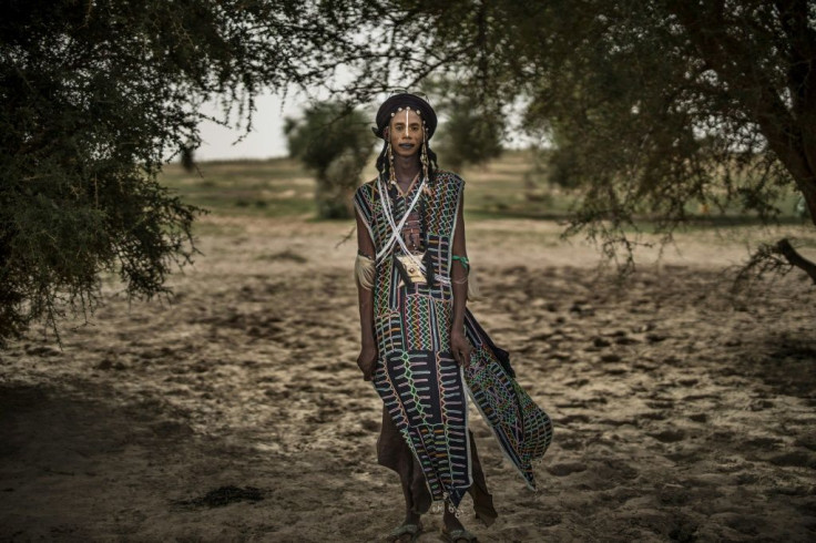 Time for celebrations: Ousman, a man from the Wodaabe group of the Fulani, poses in traditional attire in Bermo