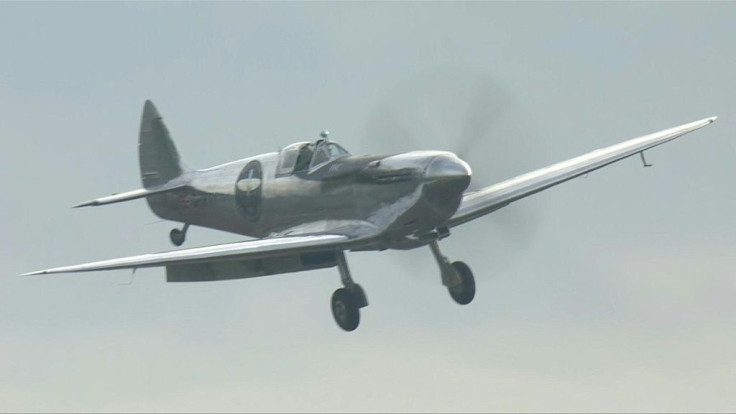 A Silver Spitfire lands at Goodwood aerodrome in the UK after completing a record-breaking round-the-world flight, some four months after its pilots set off on their expedition.