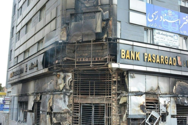 A scorched branch of the Pasargad bank, which was set ablaze by protesters, is seen in November 2019 in Eslamshahr, near the Iranian capital Tehran