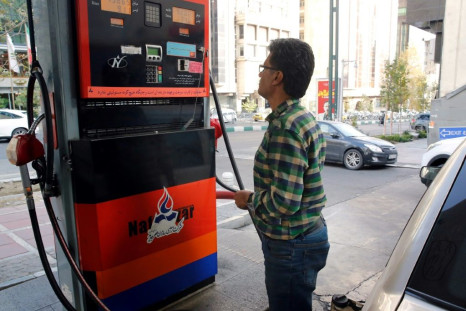 Iranians pump gas in Tehran in November 2019 amid a sudden hike in prices