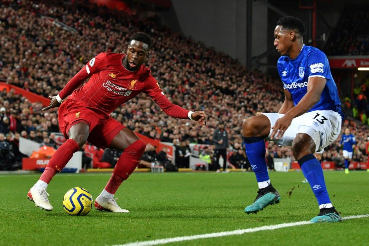 Divock's double: Divock Origi (left) scored twice for Liverpool against Everton on Wednesday