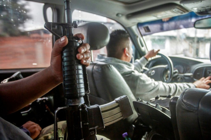 Rangers inspect an area in Michoacan state where forests cleared by criminal gangs are being recovered
