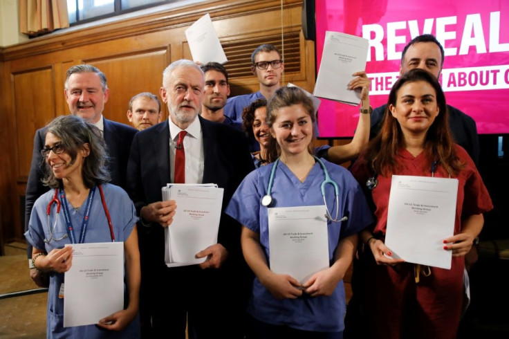 Opposition Labour party leader Jeremy Corbyn has accused the ruling Conservative government of being ready to sell off the health service to US President Donald Trump -- who has professed no such interest