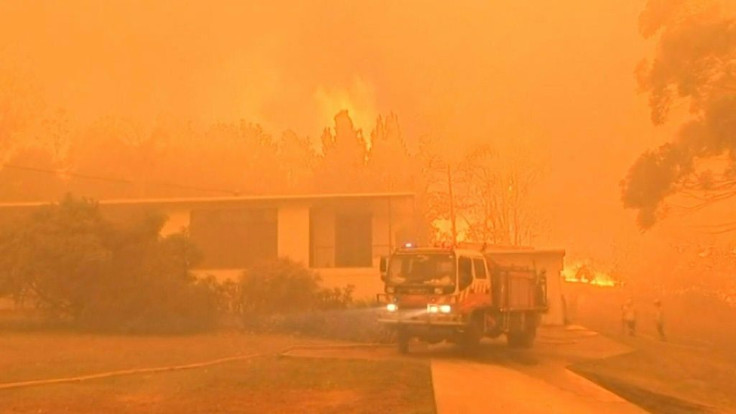 Several Australian bushfires have combined to form a "mega fire" that is burning out of control across a swathe of land north of Sydney.