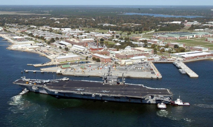 The USS John F. Kennedy is pictured in 2004 at the Naval Air Station in Pensacola, Florida, where a shooter was killed after opening fire on December 6, 2019