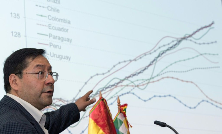Bolivia's then economy minister Luis Arce speaks at a conference in Washington in 2017
