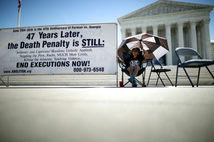 An opponent of the death penalty outside the Supreme Court