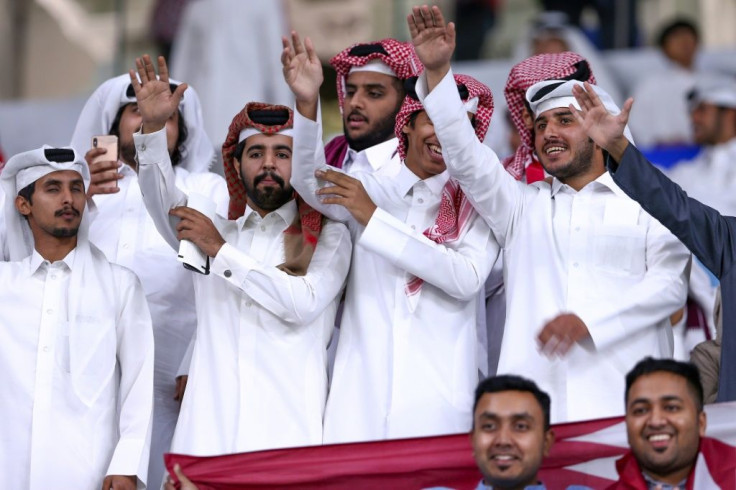 Qatari football fans cheer as the emirate hosts Saudi Arabia in the semi-final of the Gulf Cup, which the kingdom took part in in what was widely seen as a conciliatory move