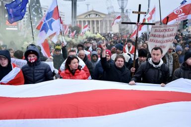 Belarusian protesters march in the capital Minsk against the prospect of closer ties with Russia
